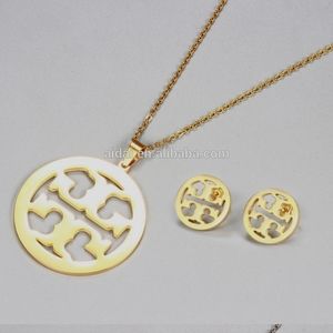Tory Burch necklace and earring set.